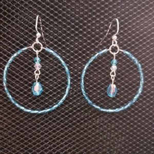 Aqua twisted bugle bead and iridescent glass crystal hoop earrings